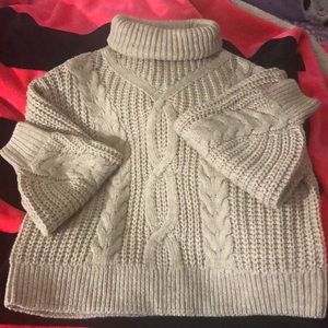 Beige knit turtleneck sweater